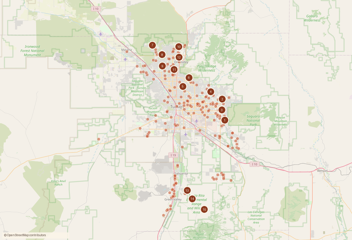 Mapa del área metropolitana de Tucson con un punto por cada venta de vivienda registrada esta semana y marcadores numerados para las ventas más grandes